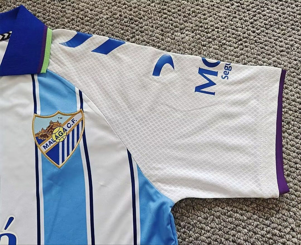 MÁLAGA PRIMERA EQUIPACIÓN 26/27 Manga Corta